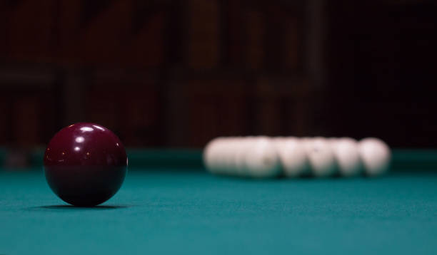 istock Russian billiard:  red and white balls on green game table 1138596565