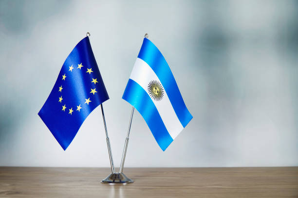 istock European Union and Argentinian flag standing on the table 1138599633