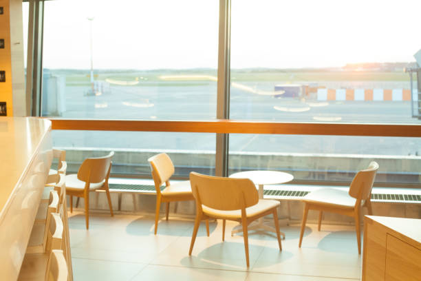 istock Waiting for the flight. Airport through the gate window 1138600418