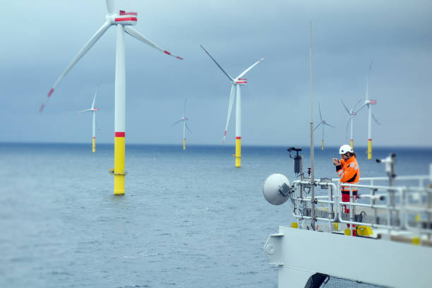 electrician making inspection of telecommunication and athena on offshore platform - wind turbine fuel and power generation clean industry imagens e fotografias de stock