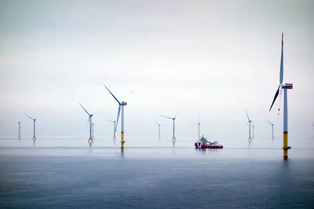 Wind-turbine, offshore, worker, boat, sea, sun, vessel