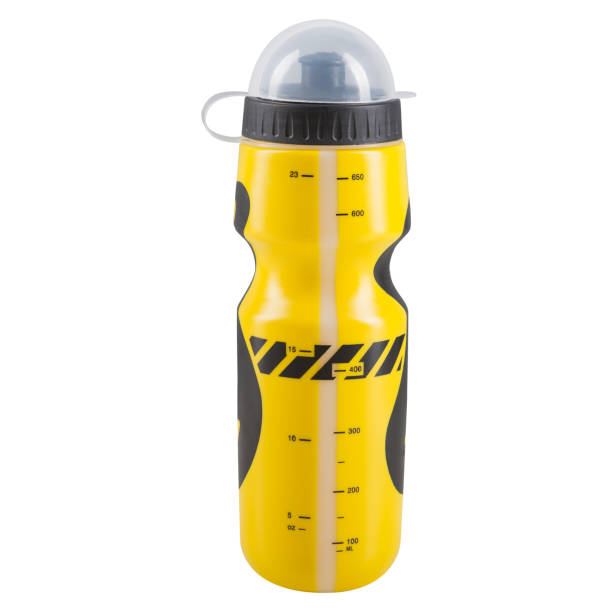 istock yellow plastic bicycle bottle for water, on a white background 1138600890
