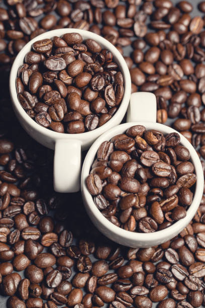 istock Coffee Beans and Coffee Cups During Coffee Drinking 1138603958