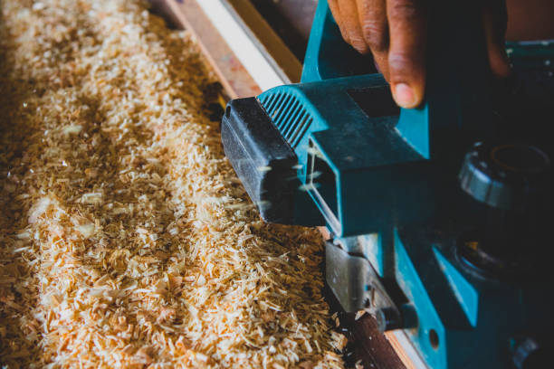 istock close up wood drill machine working  in home work shop 1138608601