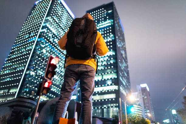 istock Backpacker in front of skyscraper in Shanghai 1138609216