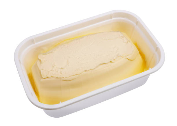 istock Creamy margarine in an industrial plastic container box. Isolated 1138610232