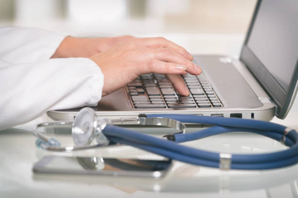 istock Medical doctor typing on laptop 1138612510
