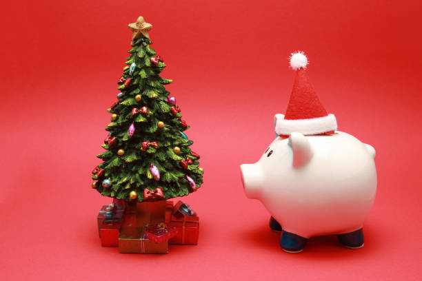 istock funny piggy bank in santa hat 1138612735