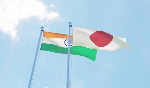 istock India and Japan, two flags waving against blue sky 1138613544