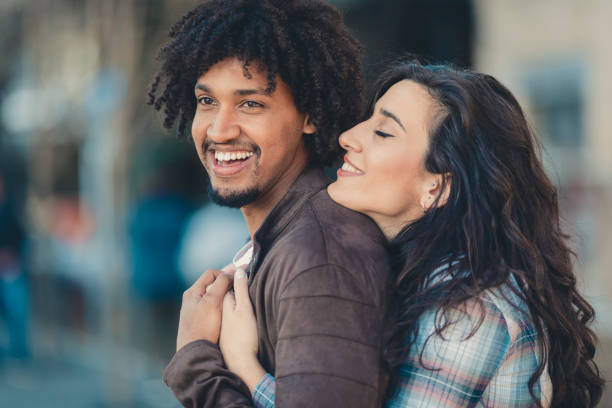 istock Beautiful young couple having fun outdoors on a lovely day 1138615892