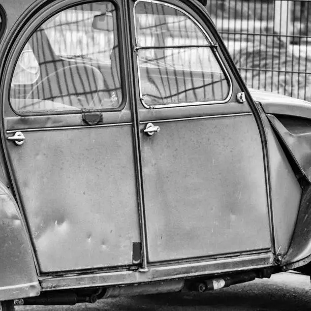 Old Citroën 2CV parked in the harbour in amsterdam the netherlands