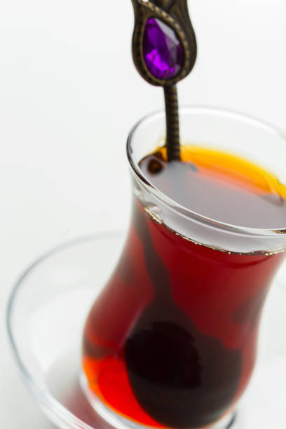 istock Turkish tea in traditional glass isolated on white background 1138616883