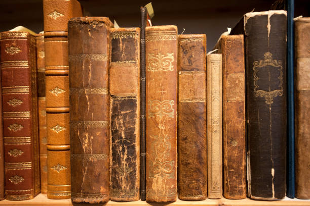 istock Antique books in leather covers, printed at 19th century and before. Knowledge background of library or bookstore 1138617504