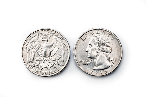 two US Dollar Quarter Coin on white background