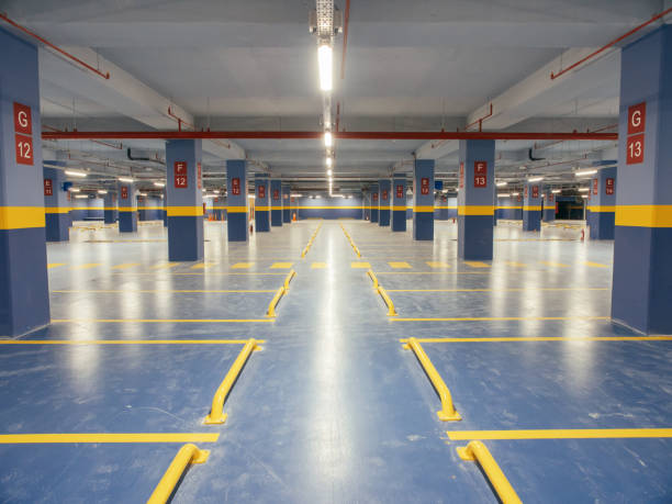 istock Image of parking garage underground interior 1138618549