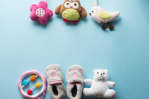 istock kid flat lay on blue background with toys . copy space, place for text 1138619762