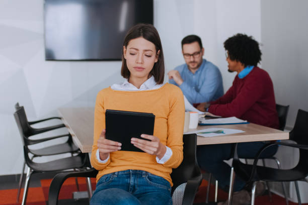 istock Young businesswoman using digital tablet in the office 1138623962