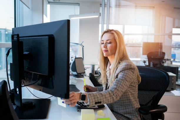 istock Business woman working at the office 1138626344