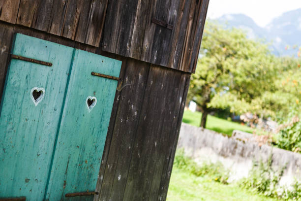 istock A window with hearts in an old house canted angle or oblique angle 1138627474