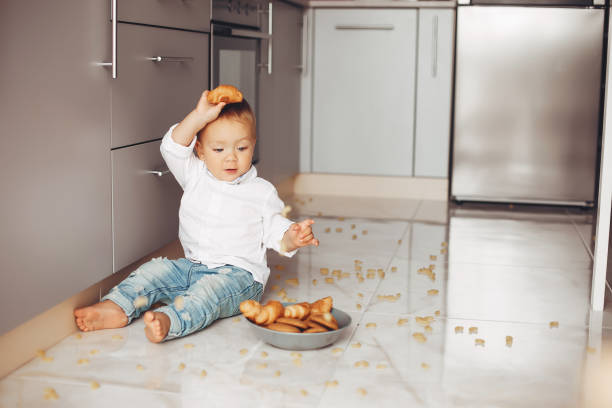 istock Little boy at home 1138630297