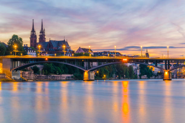istock Basel Minster viewed behind the Wettstein Bridge during sunset, Switzerland 1138633218