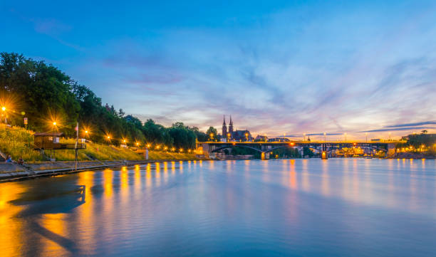 istock Basel Minster viewed behind the Wettstein Bridge during sunset, Switzerland 1138633473