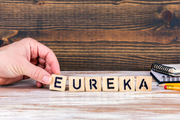 istock Eureka. Wooden letters on the office desk 1138633576