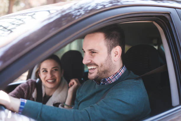 istock Couple driving car 1138634653