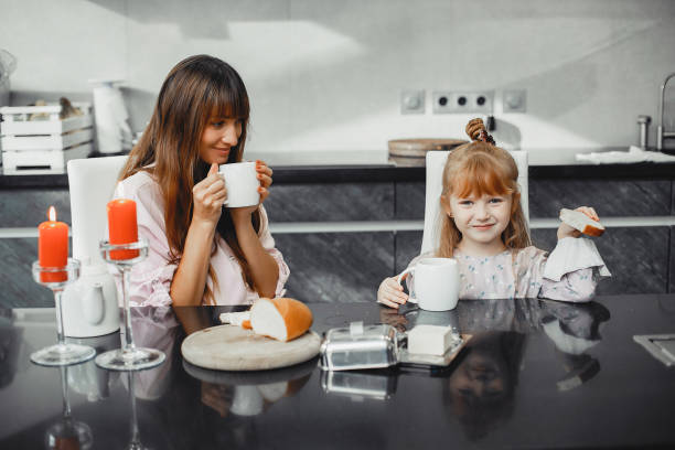 istock Mother with daughter in a kitchen 1138634902