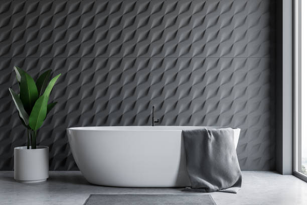 istock Gray tiled bathroom interior with tub 1138636753