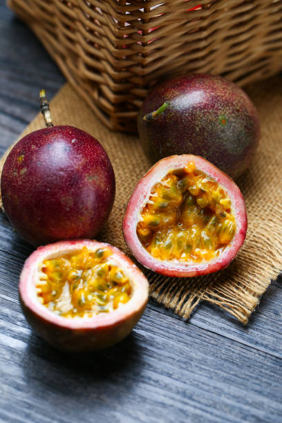 istock fresh passion fruit on dark wooden table 1138637199