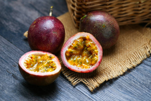 istock fresh passion fruit on dark wooden table 1138637519