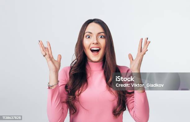 Surprised Amazing Woman Isolated On White Background Stock Photo - Download Image Now