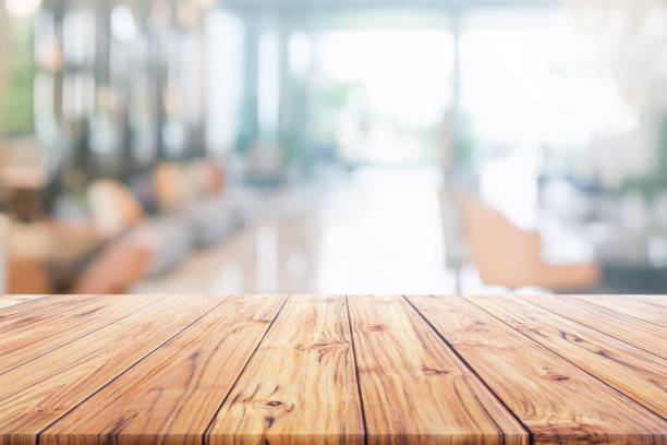 istock Wood table top on blurred interior reception hotel or modern hallway for background Ready used us display or montage products design 1138637993