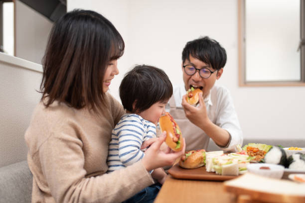 istock Family eating lunch at home 1138639251