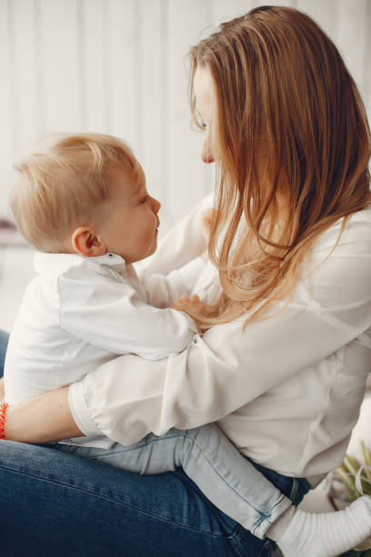 istock Mother with little son in a room 1138639431