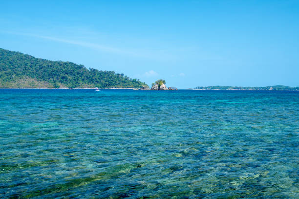 istock tropical island in the sea 1138640590