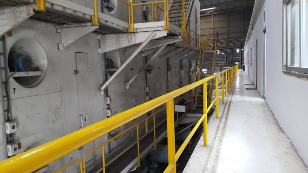 istock Walk way with yellow handrail in side of Paper machine 1138640843