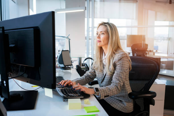 istock Business woman working at the office 1138642229