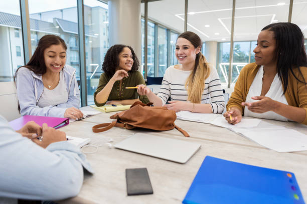 istock Group of college students brainstorm project ideas 1138642643