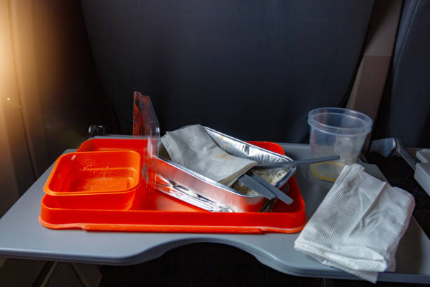 istock Dirty tray after snack on the plane. 1138644758