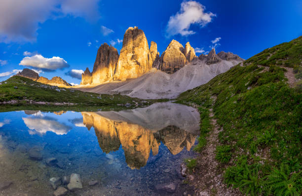 istock Iconic Tre Cime peaks from Tre Cime di Lavaredo Loop trail at sunset , Italy 1138645095