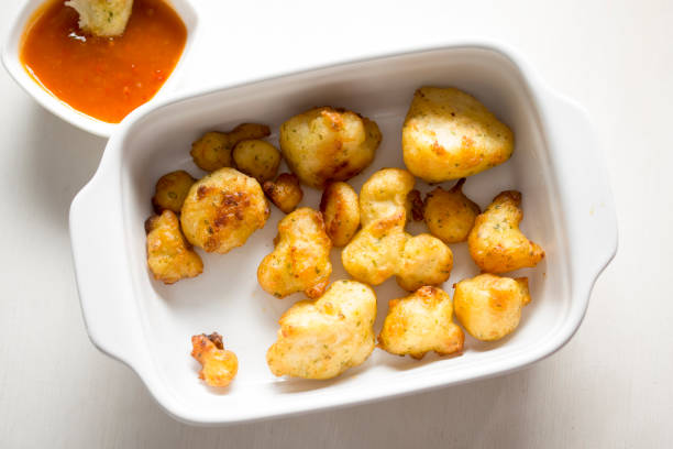 istock Cauliflower popcorn, coated mini cauliflower florets in a light batter with a spicy Buffalo dip 1138648917