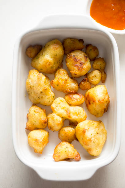 istock Cauliflower popcorn, coated mini cauliflower florets in a light batter with a spicy Buffalo dip 1138649948