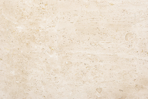 Closeup beige marble with natural pattern texture background. Horizontal picture.