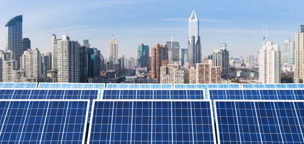 istock Solar panels and urban construction background 1138651445