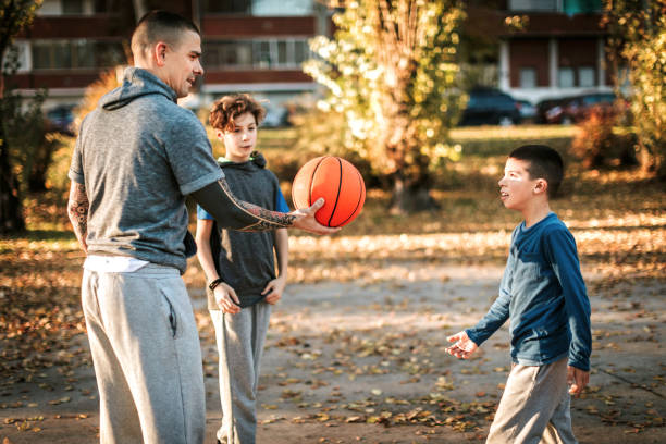 istock With father on basketball field 1138651624