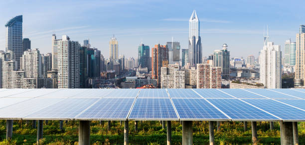 istock Solar panels and urban construction background 1138651647