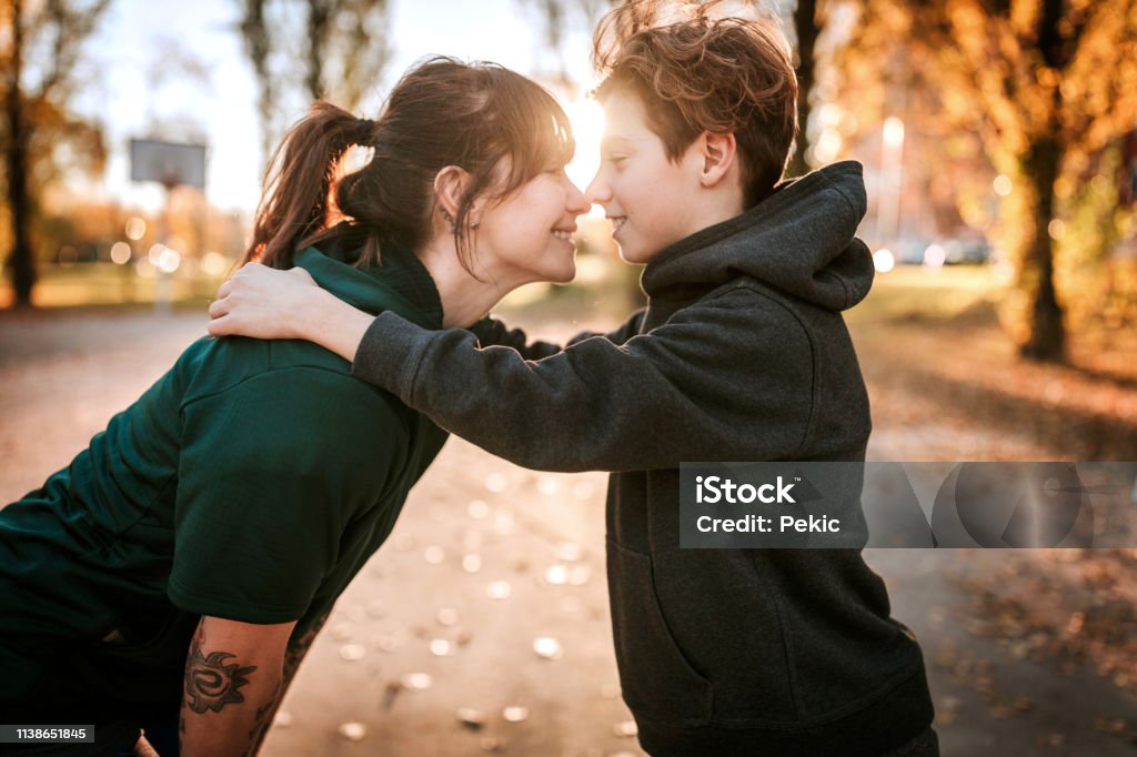 Affectionate Love Between Mom And Son Stock Photo - Download Image Now -  Mother, Teenager, Son - iStock