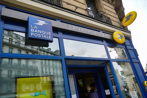 Paris, France - March 18, 2019: La Banque Postale signboard. La Banque postale is a French bank, created on 1 January 2006 as a subsidiary of La Poste, the national postal service